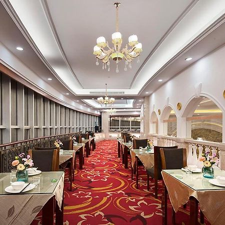 Vienna International Hotel Fenghua Zhongshan Road Bagian luar foto