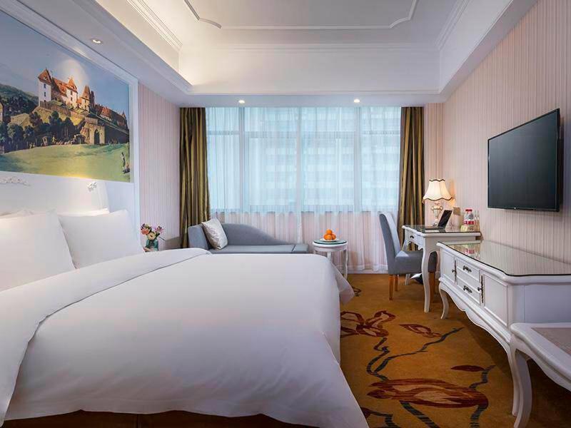 Vienna International Hotel Fenghua Zhongshan Road Bagian luar foto