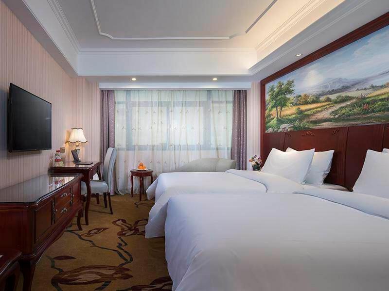 Vienna International Hotel Fenghua Zhongshan Road Bagian luar foto