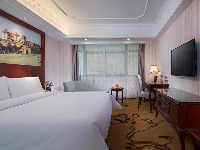 Vienna International Hotel Fenghua Zhongshan Road Bagian luar foto