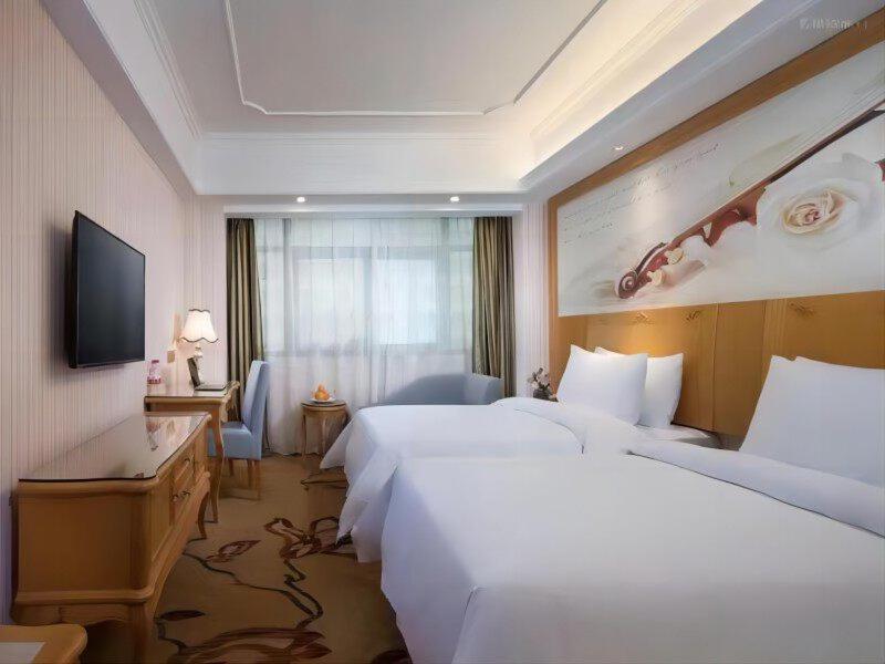 Vienna International Hotel Fenghua Zhongshan Road Bagian luar foto