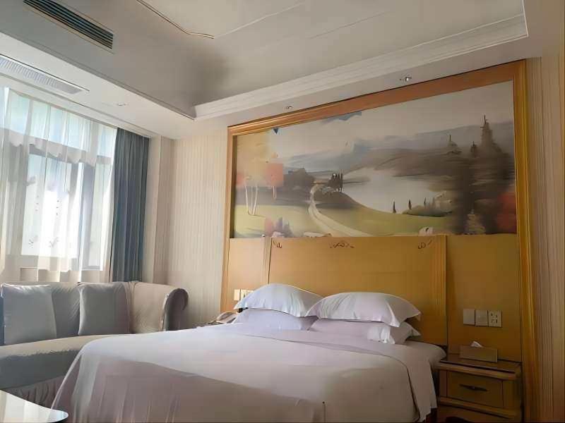 Vienna International Hotel Fenghua Zhongshan Road Bagian luar foto