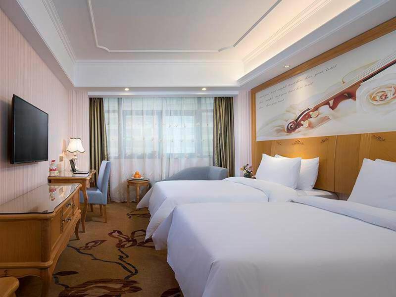Vienna International Hotel Fenghua Zhongshan Road Bagian luar foto