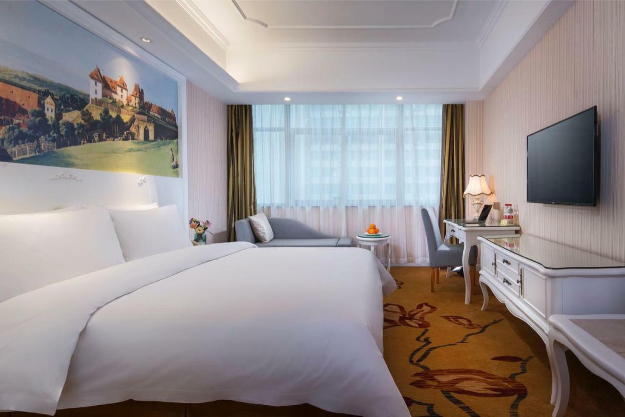Vienna International Hotel Fenghua Zhongshan Road Bagian luar foto