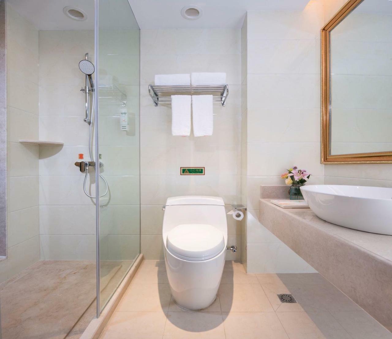 Vienna International Hotel Fenghua Zhongshan Road Bagian luar foto