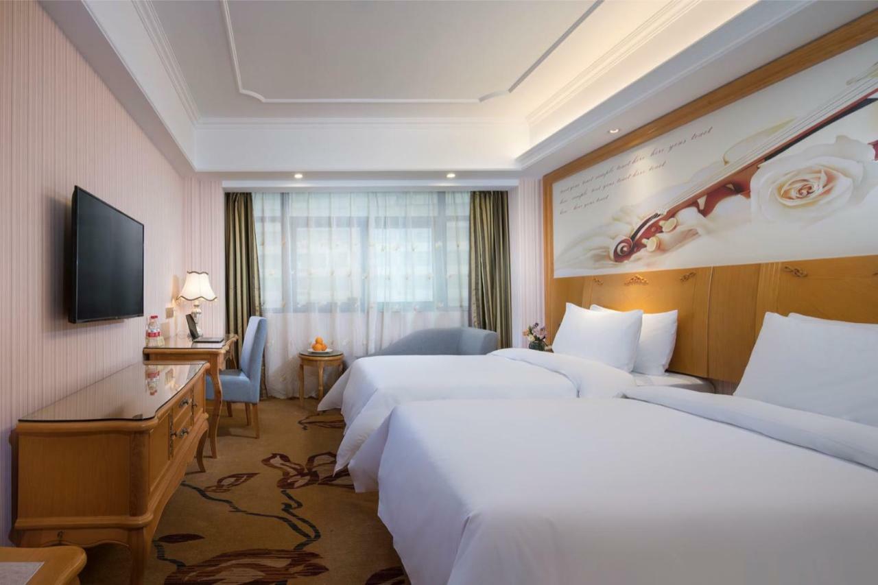 Vienna International Hotel Fenghua Zhongshan Road Bagian luar foto