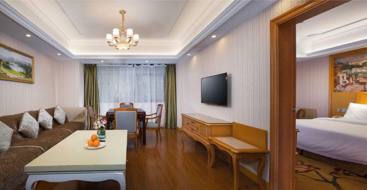 Vienna International Hotel Fenghua Zhongshan Road Bagian luar foto