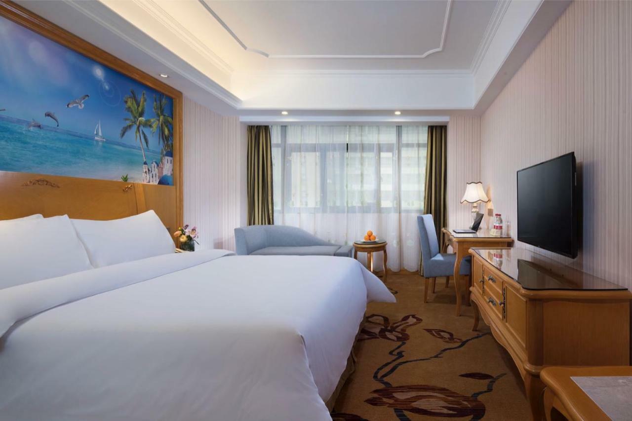 Vienna International Hotel Fenghua Zhongshan Road Bagian luar foto
