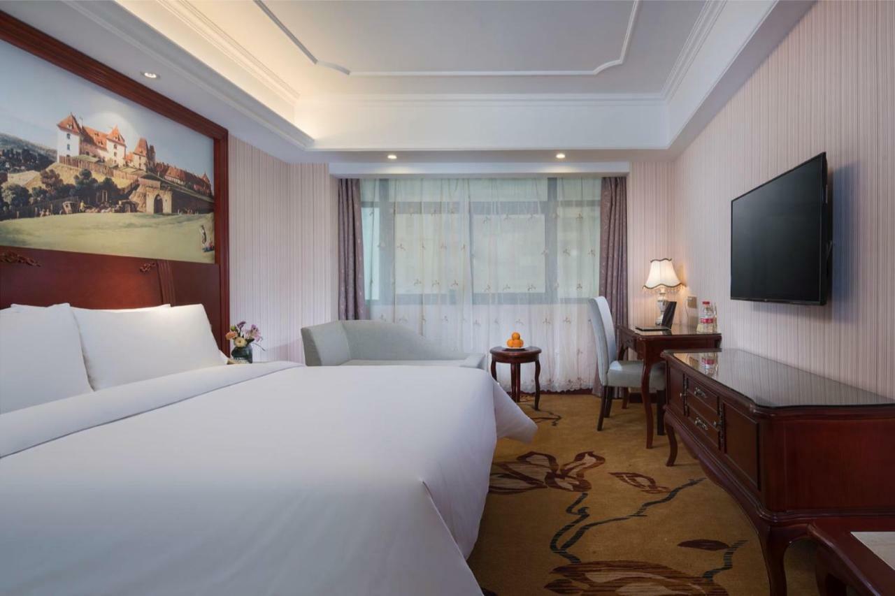 Vienna International Hotel Fenghua Zhongshan Road Bagian luar foto